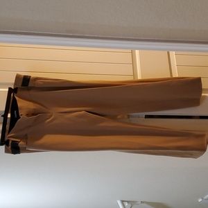 Express tan with black trim suit size 12